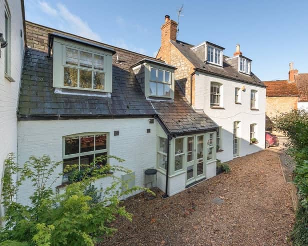 This original, stone, brick and slate late Victorian cottage has been tastefully upgraded and maintained added to create a versatile, modern family home.