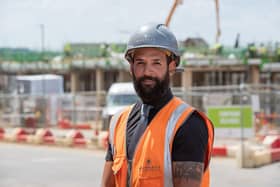 BN - SGB-750 - Ashley Washington outside a brand new Barratt home currently under construction