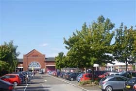 The distraction theft happened in the car park of Tesco at Wolverton in Milton Keynes