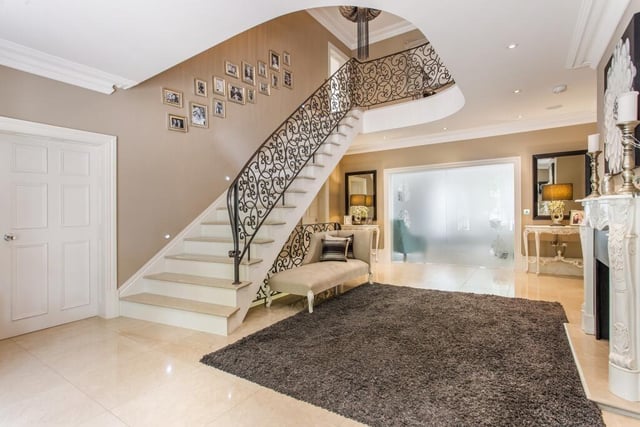 How about this for an grand entrance - leading to large lounge , beautiful fitted kitchen, bar, dining room, library/playroom and utility/boot room.