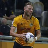 Cameron Norman has signed for MK Dons after leaving Newport County