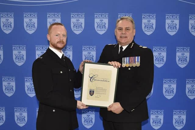 PC James Dalton receives his award from Chief Constable John Campbell