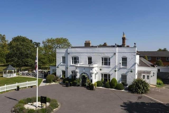 Woughton House Hotel has been housing asylum seekers for two years. Now the contract is to be terminated,