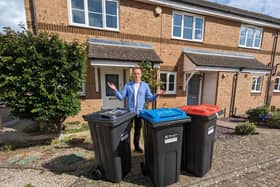 Adam Lane with his new bins. He says the council has fly-tipped them as he didn't want them at his MK home