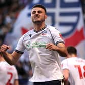 Bolton striker Aaron Collins has been linked with a move to MK Dons