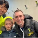 Young Alexander, pictured with dad Andrew, is a big Tottenham fan