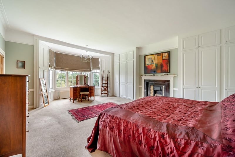 This is the first of seven bedrooms. It has two built-in wardrobes and an en suite