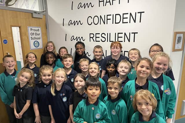 Long Meadow Primary School pupils received badges and certificates for doing maths tasks during the school holidays