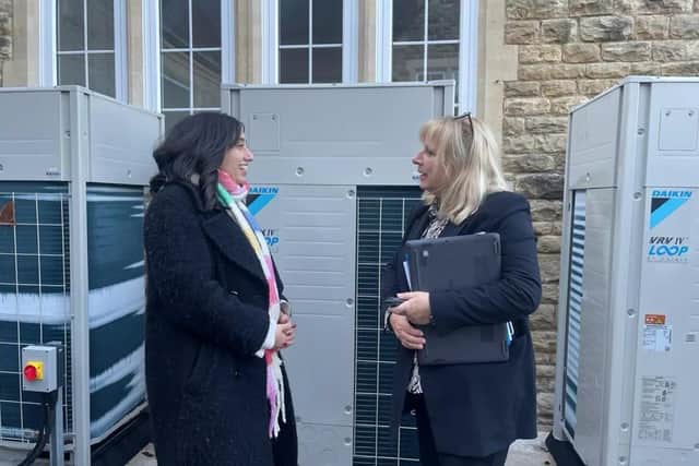 Two women speaking about sustainability.