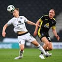 MK Dons loanee Dan Kemp is rated as the best player in League Two this season after a sizzling start with Swindon Town.