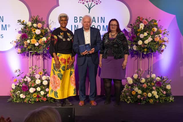 Arit Anderson celebrates the National Judges’ Heritage Orchard Award with Stony in Bloom’s Ray Cobley and Binaca-Bendig-Ceesay