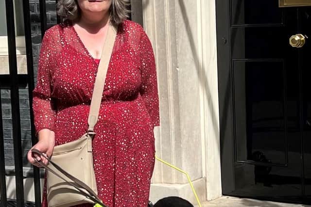 Elaine Maries and her guide dog