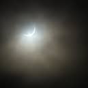 Milton Keynes residents can catch a partial solar eclipse on Wednesday, August 12, with around 90 to 96% of the sun being covered by the moon.  Photo: AFP via Getty Images/ Andy Buchanan