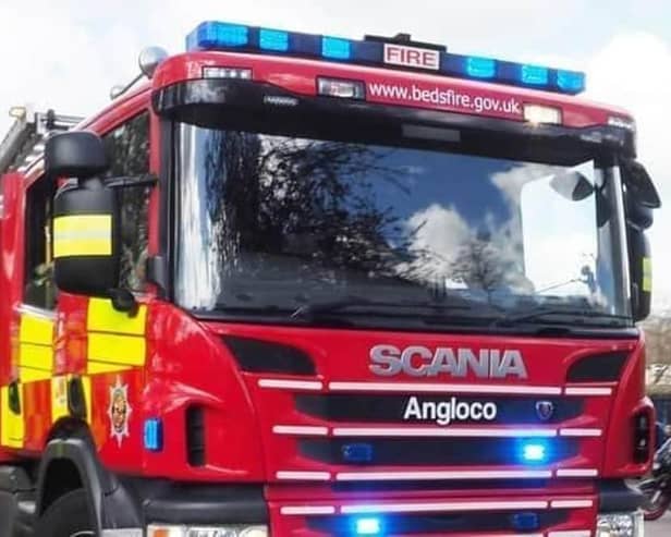 Eight firefighters dealt with a socket that caught fire in a Milton Keynes house