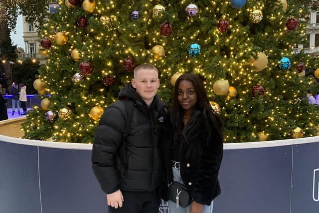 Yami Moloteni, pictured with her boyfriend, is looking forward to her first cancer-free Christmas in 2 years