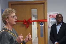 Mayor Marie Braburn preparing to cut the ribbon