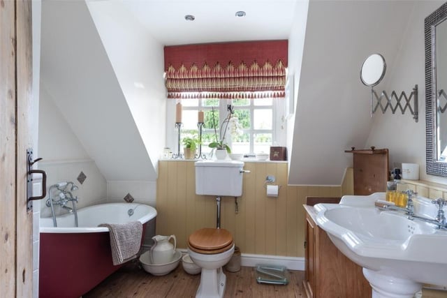 The family bathroom has a white suite comprising free standing roll top cast iron bath, pedestal wash hand basin, low level wc and fully tiled shower cubicle. There is a heated towel rail and Karndean flooring.