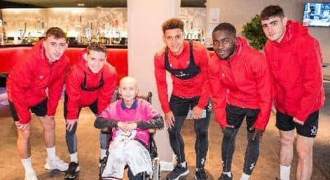 Jude met MK Dons players to promote the brain tumour charity challenge