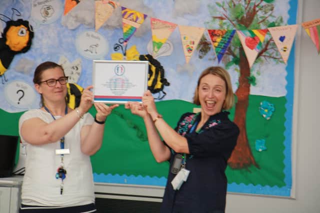 A special assembly was held at P:ortfield Primary School to celebrate its new status