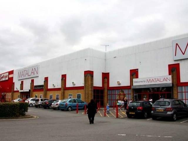 The worker fell through the roof of this retail unit in Bletchley