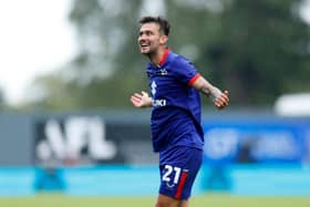 MK Dons are 11/4 shots for promotion after their opening day win at Wrexham.