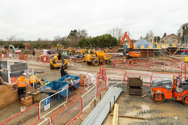 BG - 20012132 - Works taking place on a busy construction site.