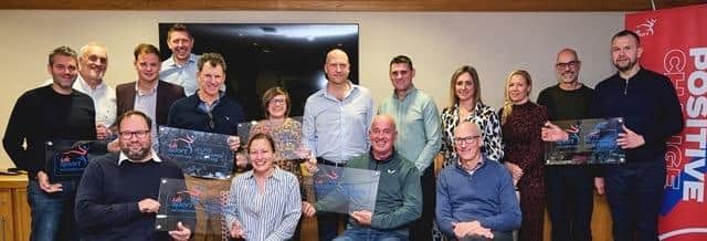 Representatives of eight organisations, including MK National Badminton Centre, pictured at the ETC Accreditation Awards