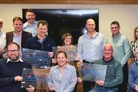 Representatives of eight organisations, including MK National Badminton Centre, pictured at the ETC Accreditation Awards