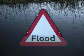 Firefighters rescued a dog after a car became trapped in flood water in Great Brickhill this morning