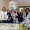 Cllr Fuller with Family Centre staff, volunteers and families at the new Netherfield food larder