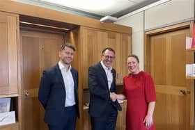 Emily Darlington MP with new postmaster Elliot Jacobs and Post Office representative Jack Foden