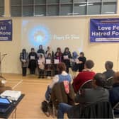 Children reciting peace poem