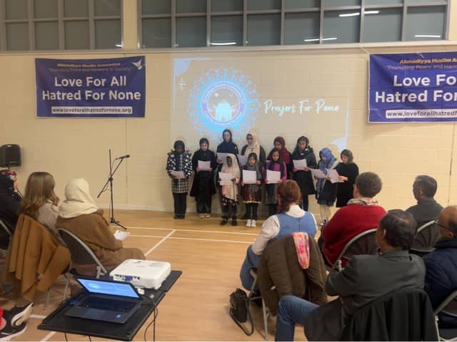 Children reciting peace poem