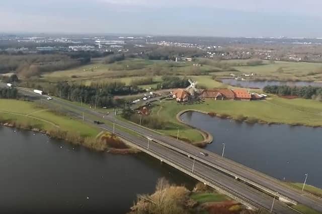The bridge that spans Caldecotte Lake is a danger to low-flying swans, which are colliding with cars travelling along it
