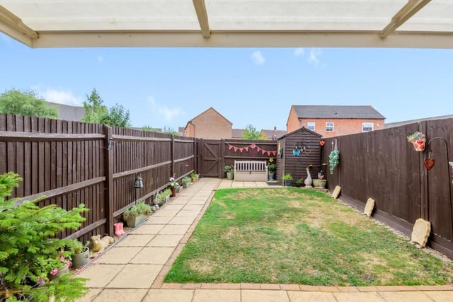 The rear garden is enclosed by timber fencing with rear gate leading to off allocated road parking