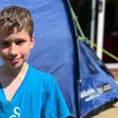 Joshua Fuller, 11, has been sleeping in his tent for year