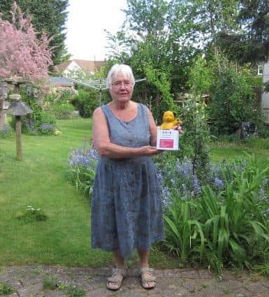 Carole Birch with one of her many Sooty collection boxes