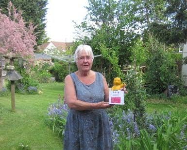 Carole Birch with one of her many Sooty collection boxes