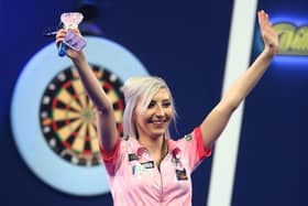 Fallon Sherrock has been awarded an MBE for her services to darts