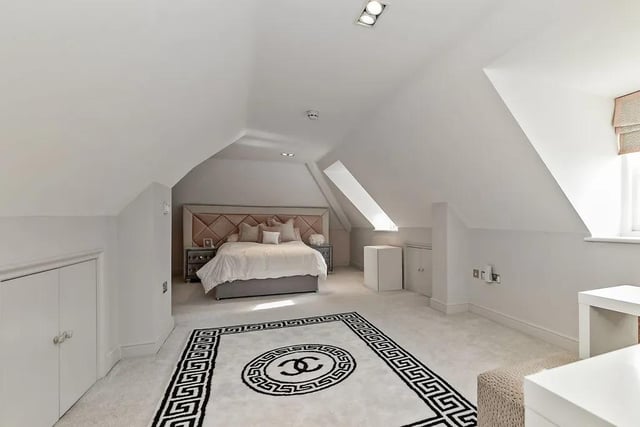 Another of the five bedrooms