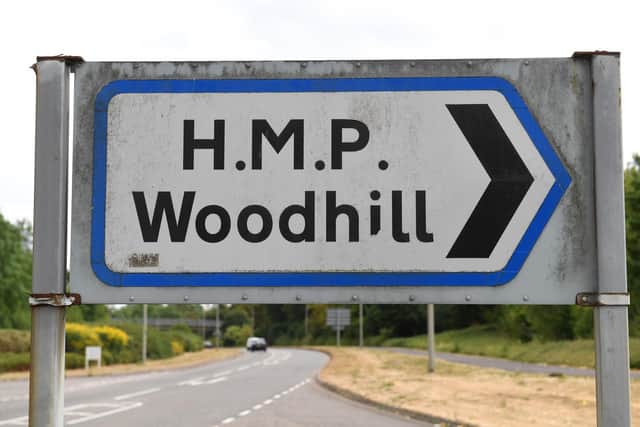HMP Woodhill sign