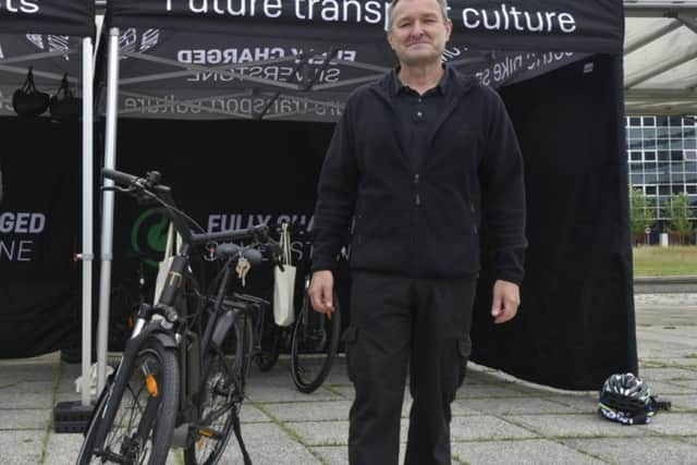 Cllr Jenny Wilson-Marklew handing over an eBike to MK’s first new loanee, Geoff