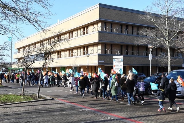 The teachers walked past the council offices, where the education department is based