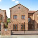 An outside view of the nine-bedroom property at Ashford Crescent in Milton Keynes