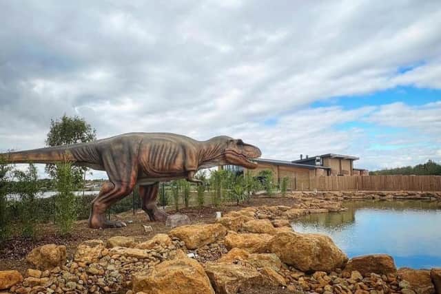 The adventure golf course features life-sized dinosaurs