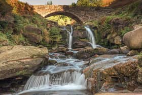 Three Shires Head. A waterfall and packhorse stone bridge at Three Shires Head in the Peak District National Park.