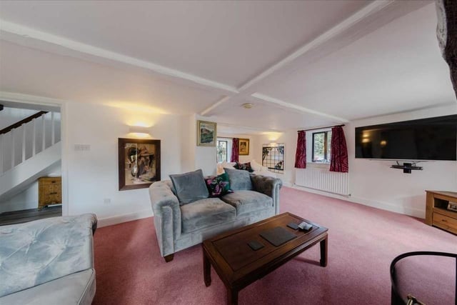 The spacious accommodation is set over three floors and features a lovely lounge area with feature fireplace