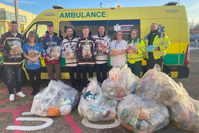 MK Lightning Ice Hockey players deliver teddies to the MK Hospitals Childrens' ward following Air the Bear.  