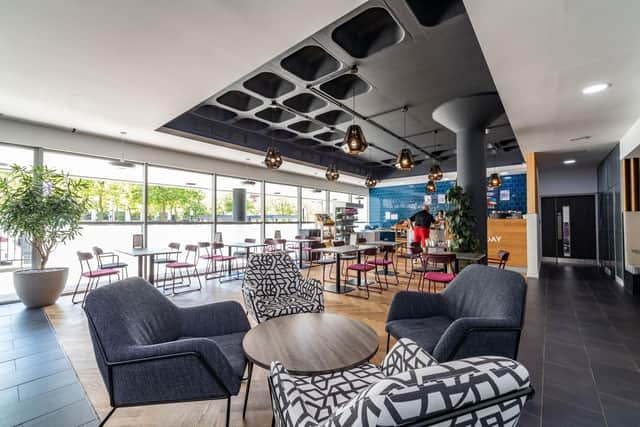 Fossil workers will enjoy a cafe and co-working lounge in their new headquarters in CMK