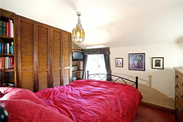 This bedroom has fitted wardrobes